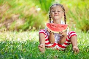 children playing outdoors fresh perspective landscapes blue mountains eating watermelon