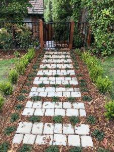 Garden Paving - Concrete Paver Stepping Stones with mulch and plants between