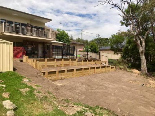 Warrimoo terraces retaining wall sloping block paving sandstone turf landscape construction blue mountains structural fresh perspective landscapes Winmalee 9
