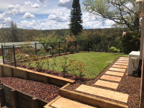 Winmalee retaining wall sloping block paving sandstone turf landscape construction blue mountains structural fresh perspective landscapes Winmalee 3